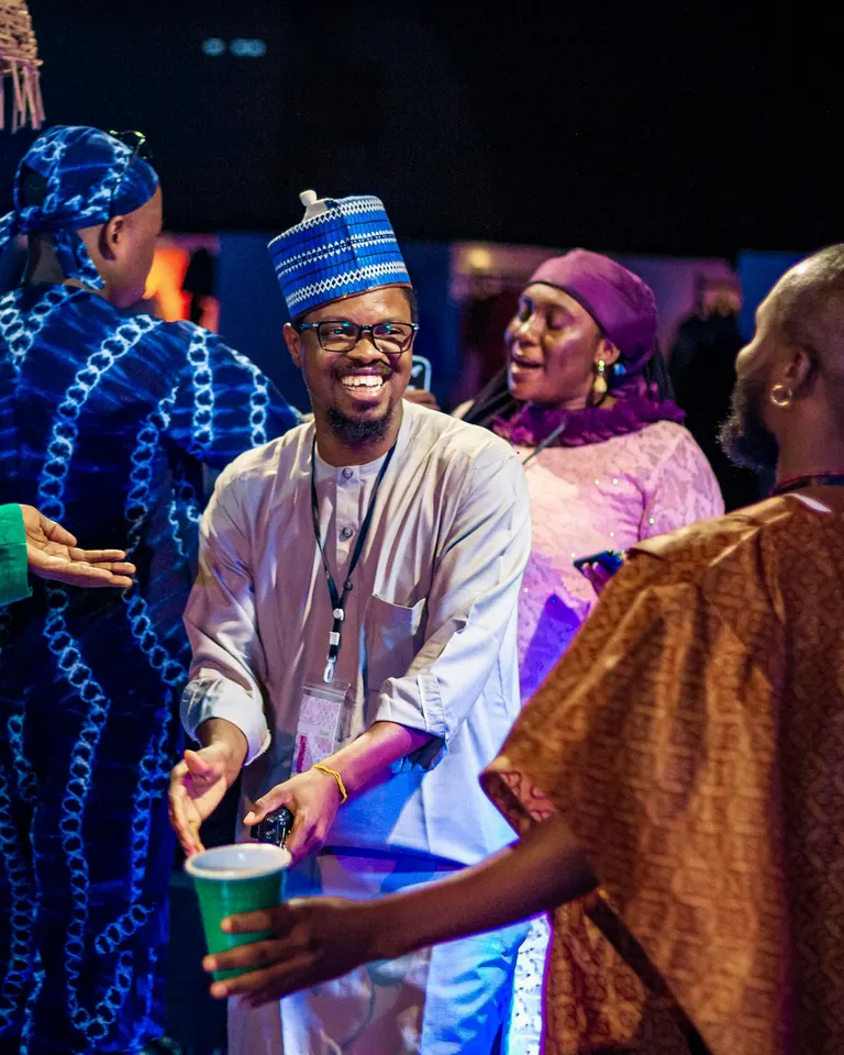 Festival guests laughing and dancing together at KAFART 2023.